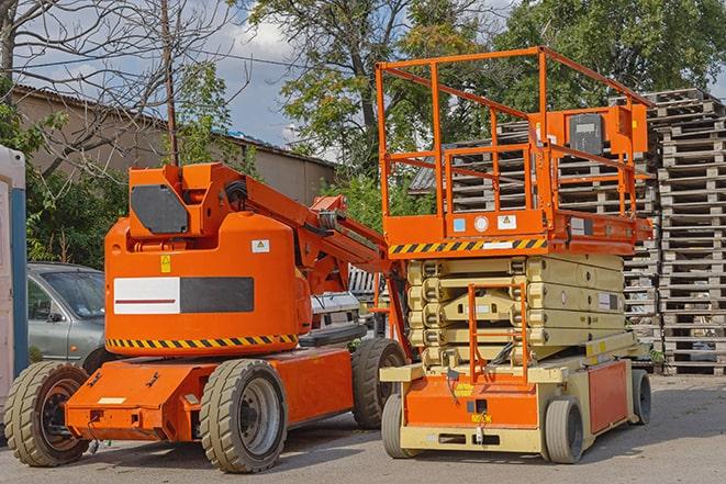 forklift maneuvering through a bustling warehouse in Grosse Pointe Woods